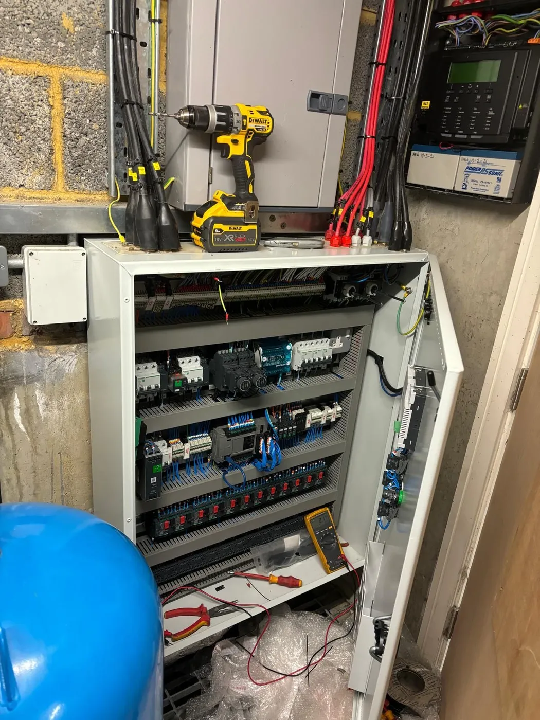 Smoke-vent control panel replacement in an apartment car park (3)